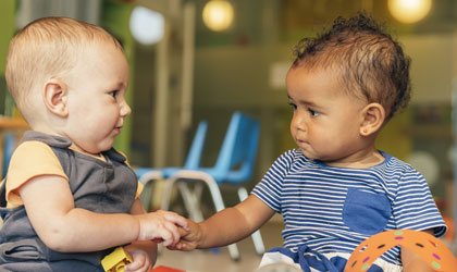 Babies Playing Together